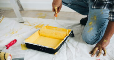 man-painting-walls-yellow (1)